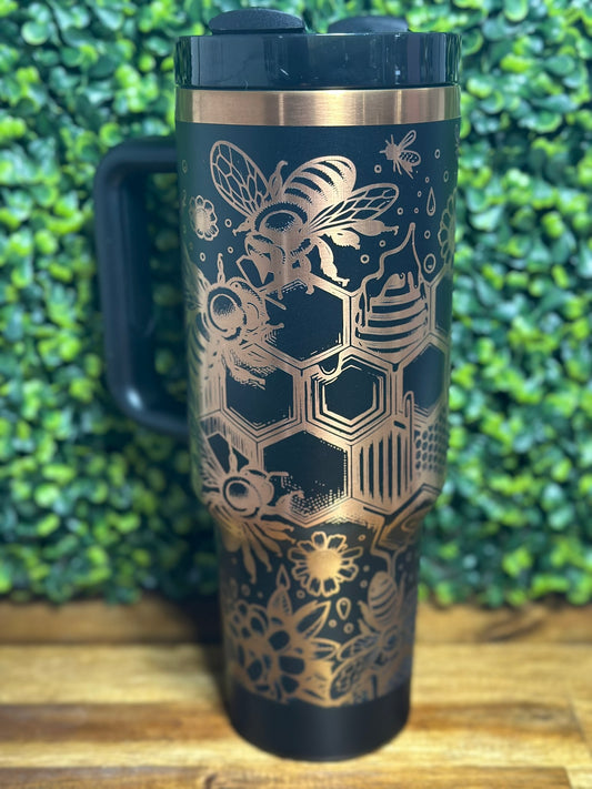 Custom designed bee tumbler with intricate floral and honeycomb patterns, perfect for coffee and cold beverages.