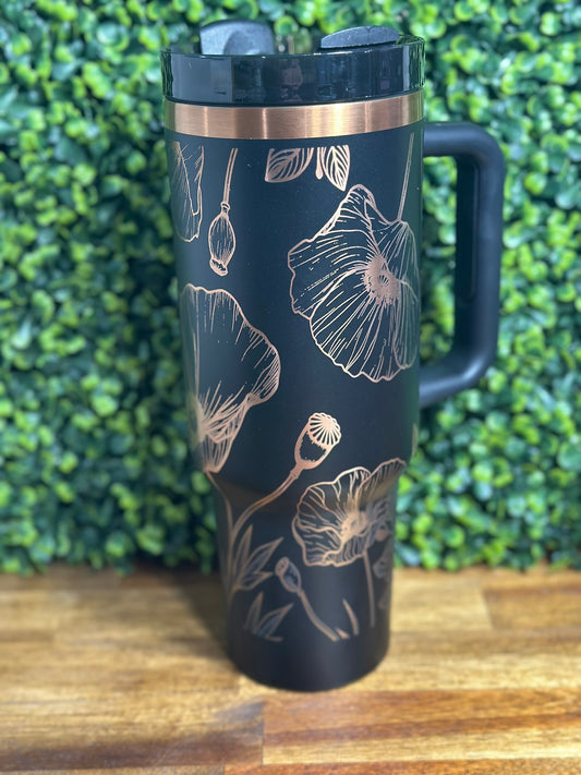 Custom designed Poppy tumbler with floral pattern in black and copper for hot and cold beverages.